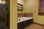 Master Bathroom with Jetted Jacuzzi and Tiled Walk-In Shower